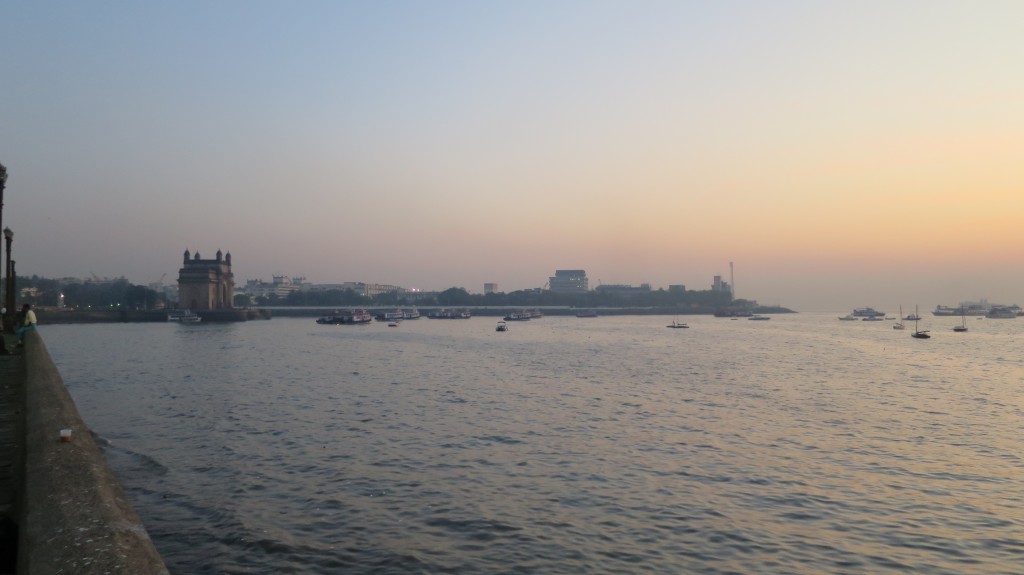 Watching the sunrise calmly close to the otherwise crowded and popular tourist spot, Gateway of India